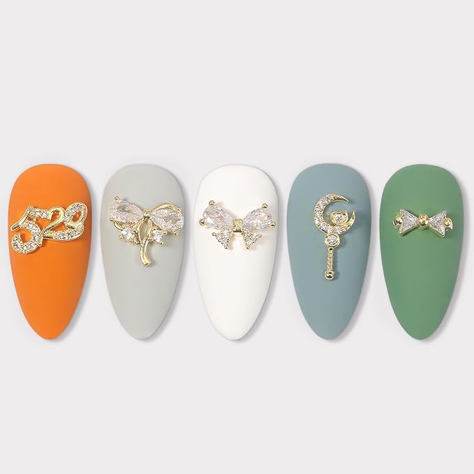 HNUIX Nail Charms and Gems - Gold Copper Zircon, Multiple Shapes 3D Dangle, Metal Luxury Jewelry Rhinestones for Nails 14 Pieces