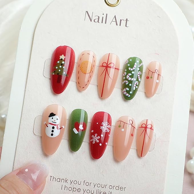 Christmas Motifs Press on Nails Almond Fake Nails Medium Length Nails Press ons with Snowman,Xmas Tree,Candy Cane,Bow Design,Reusable Festive Manicure for Holiday Parties & Winter Celebrations 24Pcs