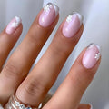 Christmas Press on Nails Medium Square Fake Nail with White Snowflake Designs White Silver French Tip Xmas False Nails Pink Full Cover Winter Stick on Nail for Women 24 Pcs