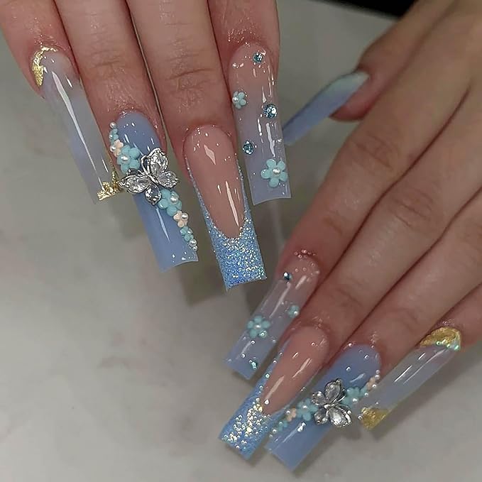RTKHFZE Long Press on Nails Square French Tip Fake Nails Blue Glitter False Nails with Butterfly and Flower Charm Designs Artificial Nails Full Cover Acrylic Stick on Nail for Women Manicure