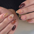 Press on Nails Medium Almond French Tip, 30 Pcs Handmade 3D Flowers Gold Lines Embossed Designs, Glossy Nude Fake Nails, Reusable Glue On Nails, Full Cover Acrylic Nails for Women Brown