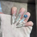 24Pcs Nude Cat Eye Press On Nails, Long AlmondFake Nails with Blue Rhinestones,Glossy Cat Eye Finish, Reusable Stick On Nails with Jelly Glue for Party & Gifts