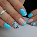 Curvlife Press On Nails – 30PCS Full Cover False Natural Fit Soft Gel Fake Nails Tips, Easy to Apply at Home Glue On False Nails Kit (Floral Accent Blue French Manicure, Short)