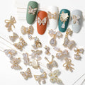 HNUIX Butterfly Nail Charms and Gems - Gold Copper Zircon, Multiple Shapes, Metal Bow-Knot Jewelry Rhinestones Charms, 27Pieces