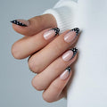 Curvlife Soft Gel Press On Nails Medium Almond Nude with Black French Tip Polka Dots, Glue On Fake Nails Reusable False Nails Stick On Nail Tips for Women