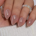 Curvlife Press On Nails Medium Almond Nude - Galaxy Cat Eye Press on Nails with Glue, Milky Tea Magnetic Glitter Glossy Fake Nails Long Lasting False Nail Tips for Women