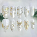 10Pcs Christmas Handmade Press on Nails Medium Almond Fake Nails White Flower False Nails with Gold Bow Snowflake Rhinestones Design Full Cover Artificial Glue on Nails Winter Stick on Nail for Women