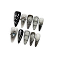 Gothic Press on Nails with Tools Kit, 10pcs Long Stiletto Glossy Nails in Black & Metallic Silver, Hand-Painted 3D Art & Round Cat Eye Charms, Edgy Style for Concerts & Parties (Size S)