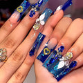 RTKHFZE Extra Long Press on Nails Square Fake Nails French Tip Acrylic False Nails with Blue Gradient Nails Designs with Rhinestones and Flower Artificial Nail Full Cover Glue on Nail for Women