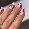Christmas Press on Nails Short Oval MABKJLF Fake Nails False Nails with Bow Stripes Pearlescent Designs Glossy Glue on Nail Winter Full Cover Acrylic Nails for Women Girls 24Pcs
