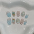 Blue French Tips Press on Nails Short Oval,Isle Blue Gradient & Hand-Sculpted Conch Relief False Nails,Ocean Whisper Fake Nails Kit,Glossy Cute Artisan Coastal Zen Nail Art with Tools 10pcs(L)