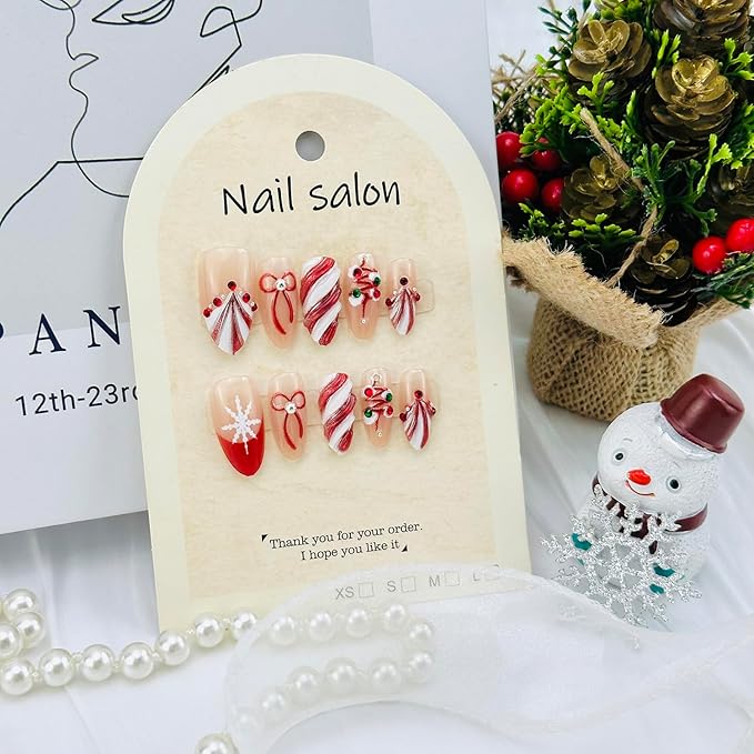 Christmas Press on Nails Medium Almond French Tip Fake Nails with 3d Bow Rhinestones Designs Winter Snowflake Glue on Nails Xmas Tree Full Cover Artificial Acrylic Nail for Women Nail Supplies 30pcs