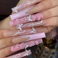 24Pcs Long Square Press on Nails Pink French Tip Fake Nails Silver Rhinestones with Flower Full Cover Tips Glue on Nails Artificial Acrylic False Nails Butterfly Charms Design for Women Manicure DIY
