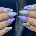 Press on Nails Almond Medium - Lavender Purple 3D Flower Fake Nails with Gold Designs, 24Pcs Glossy Glue on Nails for Women, 15-Min DIY Home Manicure Kit for Party & Events