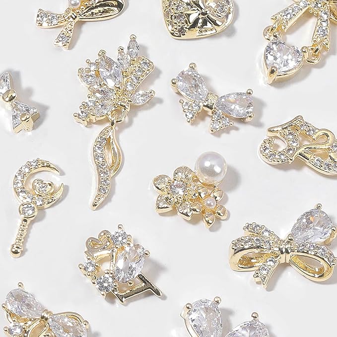 HNUIX Nail Charms and Gems - Gold Copper Zircon, Multiple Shapes 3D Dangle, Metal Luxury Jewelry Rhinestones for Nails 14 Pieces