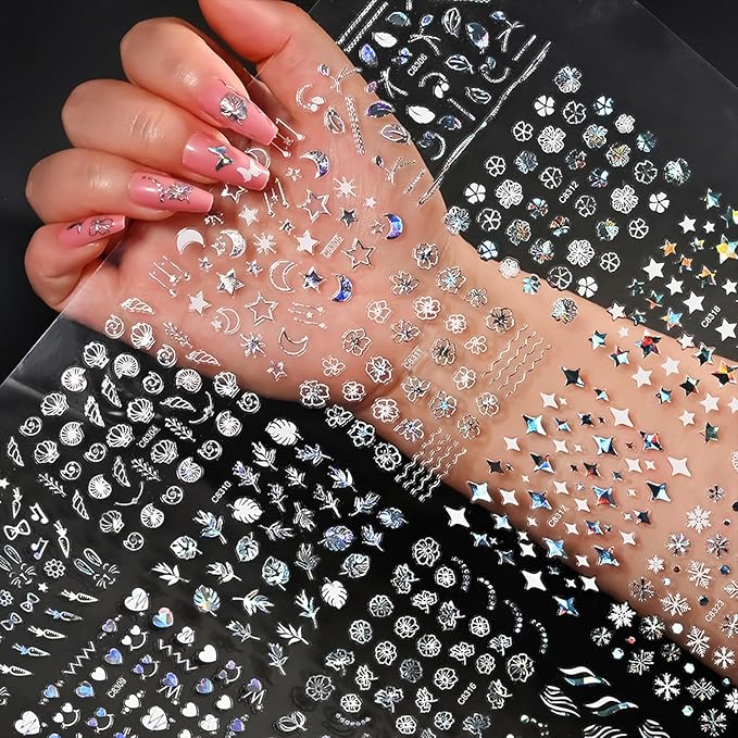 90 Sheets Silver Nail Art Stickers Holographic Laser Silver Nail Decals 3D Self Adhesive Nail Stickers for Nail Art Designs Star Line Flower Nails Supplies for Women Nail Decoration with Nail Tweezer