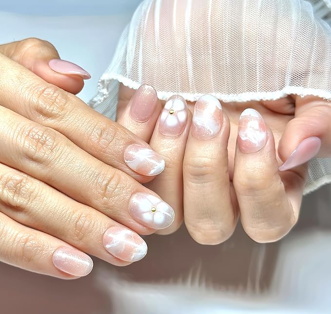 Hand-Painted Press-On Nails – Short Oval in Rosé Pink with White Floral Accents. Reusable Soft Gel Set (15 Sizes, 30 Nails + Glue) | Designed in Los Angeles | Rosé Luminesse