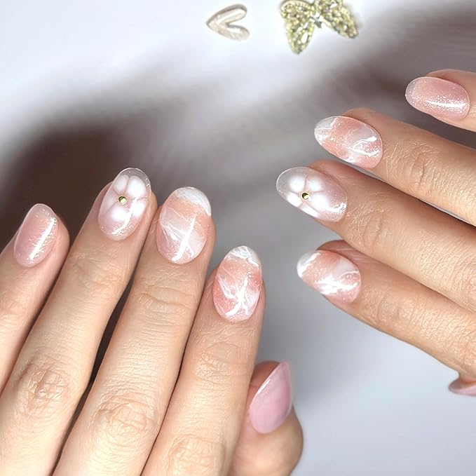 Hand-Painted Press-On Nails – Short Oval in Rosé Pink with White Floral Accents. Reusable Soft Gel Set (15 Sizes, 30 Nails + Glue) | Designed in Los Angeles | Rosé Luminesse