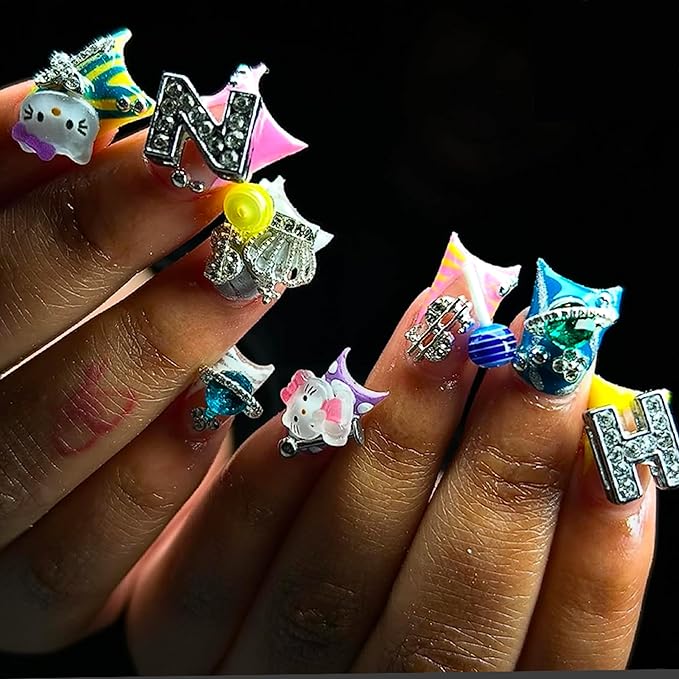 80Pcs Silver Nail Charms Set with Pink Hearts，Crosses, Stars,Butterflies, Dollars, Cherries, Crowns,Lollipop Y2k Nail Gems for Women Girls Nail Decorations DIY Craft