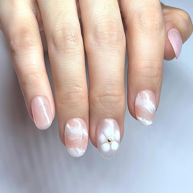 Hand-Painted Press-On Nails – Short Oval in Rosé Pink with White Floral Accents. Reusable Soft Gel Set (15 Sizes, 30 Nails + Glue) | Designed in Los Angeles | Rosé Luminesse