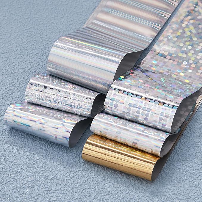 DANNEASY 12 Rolls Aurora Nail Art Foil Transfer, Iridescent Nail Foil Wraps Laser Gold Metallic Nails Stickers Starry Sky Holographic Nail Foils Design for Women Nails Supplies