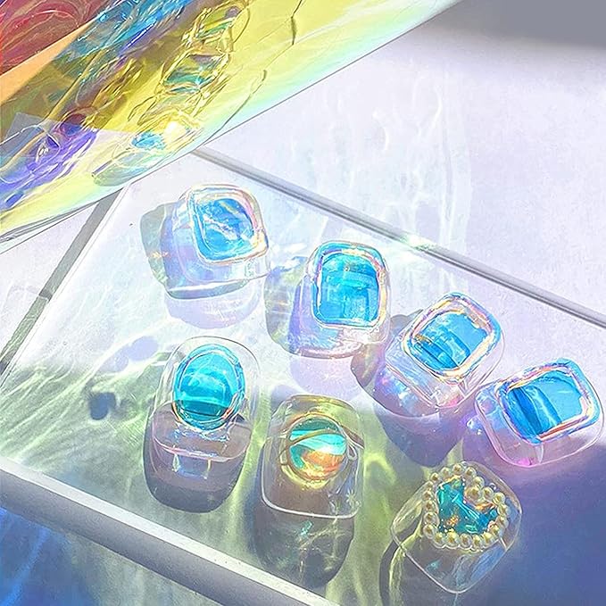 DANNEASY 12 Sheets Aurora Nail Foil Stickers Glass Paper Ice Cellophane Nail Film Foils Holographic Nails Art Stickers Decals Laser Nails Wraps for Women Girls Decoration